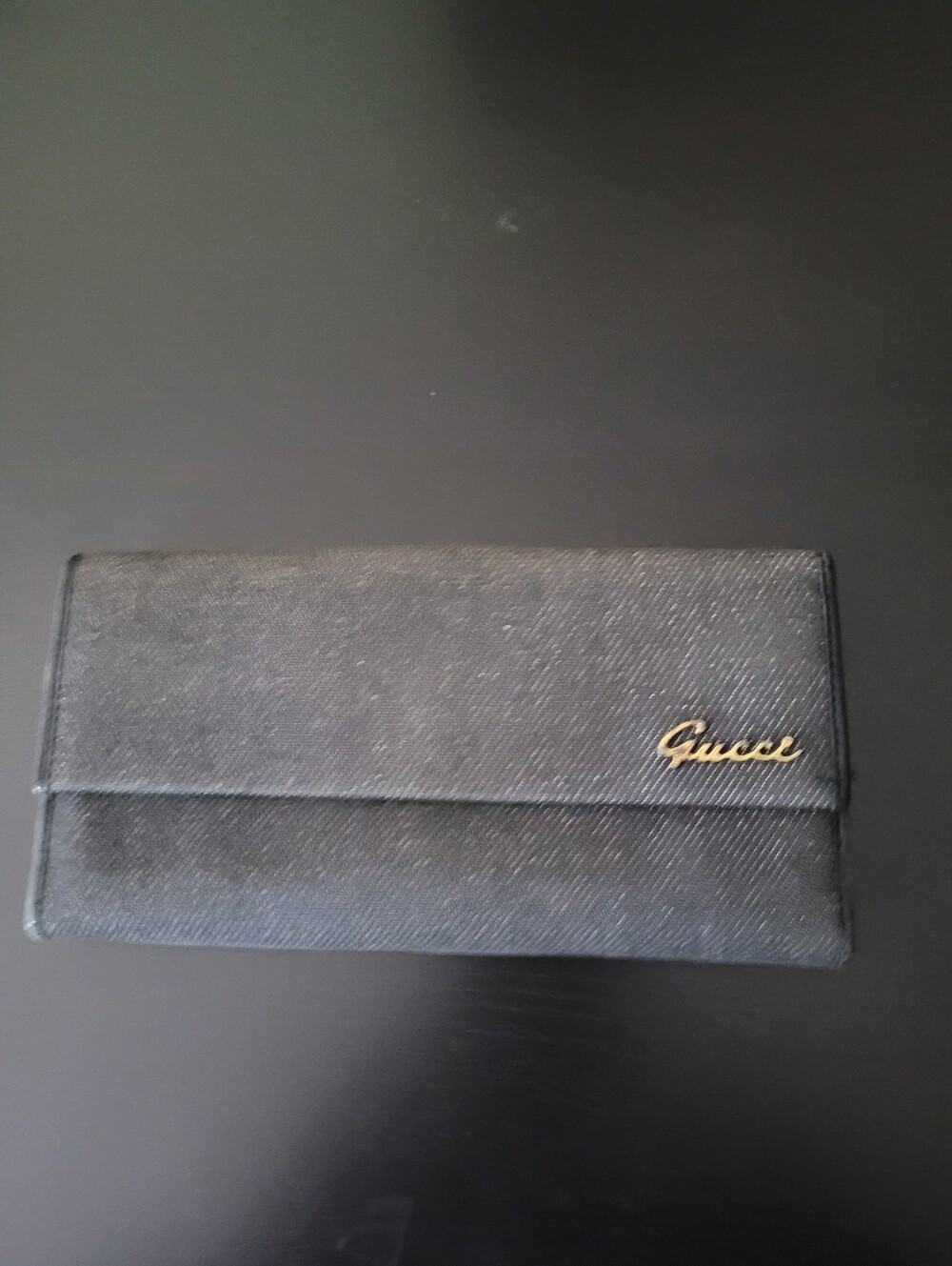 Gucci Black Saffiano Flap Wallet with Gold Script Accent